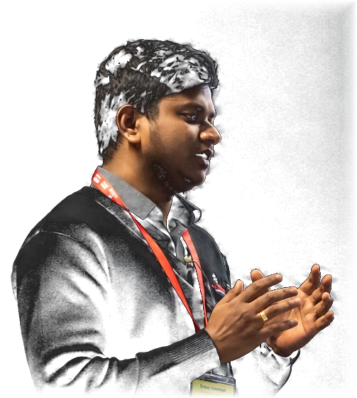 Gihan Gamage presenting on stage at a conference.